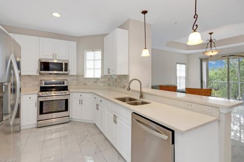 1335 Sweetwater Cv, Naples, FL 34110-4200