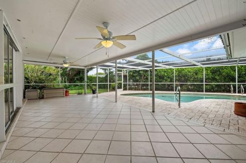 59 Pebble Bch Blvd, Naples FL 34113-8349 exterior