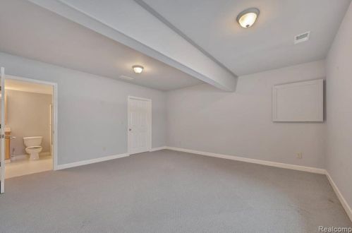 418 Devonshire Dr, Lake Nepessing MI 48446-4796 exterior