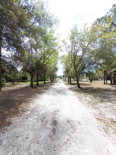 5885 Hidden Oaks Ln, Naples, FL 34119-1137