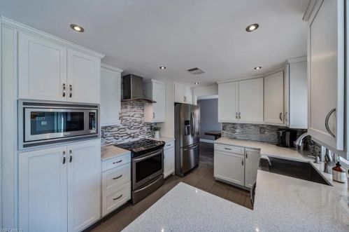 108 Mentor Dr, Naples FL 34110-1327 exterior