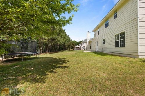 1560 Rogers Crossing Dr, Lithonia GA  30058-7005 exterior