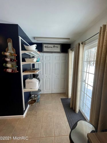 5541 Lamos Rd, Sylvan Beach MI 49461-9450 exterior