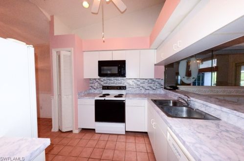 213 Countryside Dr, Naples FL 34104-6720 exterior