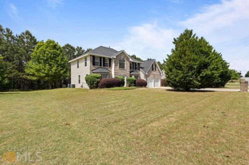 1560 Rogers Crossing Dr, Lithonia GA  30058-7005 exterior