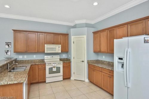 6044 Dogleg Dr, Naples FL 34113-1688 exterior