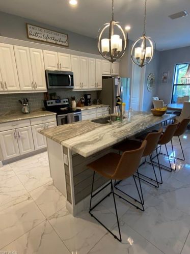 5025 Hickory Wood Dr, Naples, FL 34119-1417