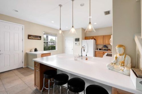 16011 Caldera Ln, Naples FL 34110-2830 exterior