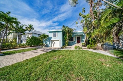 1283 Grand Canal Dr, Naples FL 34110-1506 exterior