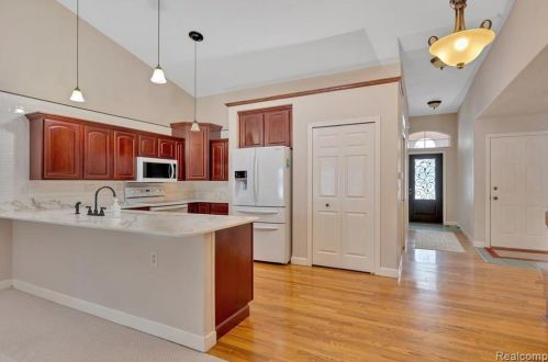 418 Devonshire Dr, Lake Nepessing MI 48446-4796 exterior