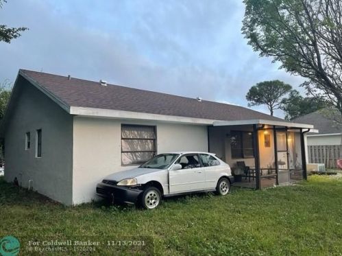 261 Pisces Ter, Fort Pierce FL 34984-4458 exterior