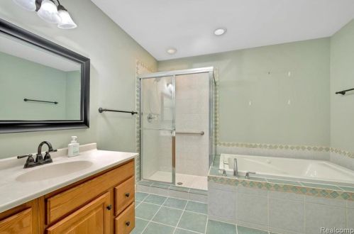 418 Devonshire Dr, Lake Nepessing MI 48446-4796 exterior