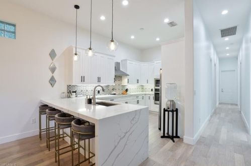 5576 Hammock Is Dr, Naples FL 34119-4695 exterior