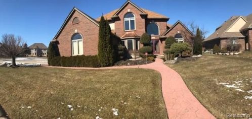 21249 Clayton Dr, Macomb Township, MI 48044-1856
