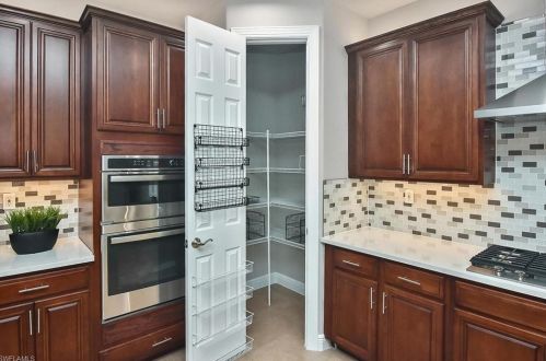 12687 Biscayne Ct, Naples FL 34105-4935 exterior