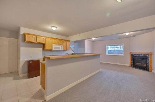 418 Devonshire Dr, Lake Nepessing MI 48446-4796 exterior