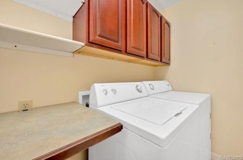 418 Devonshire Dr, Lake Nepessing MI 48446-4796 exterior