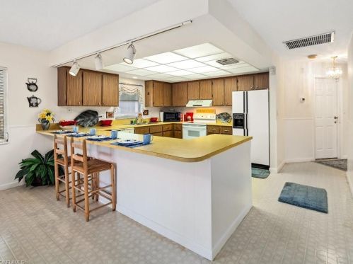 706 109 Ave, Naples FL 34108-1812 exterior