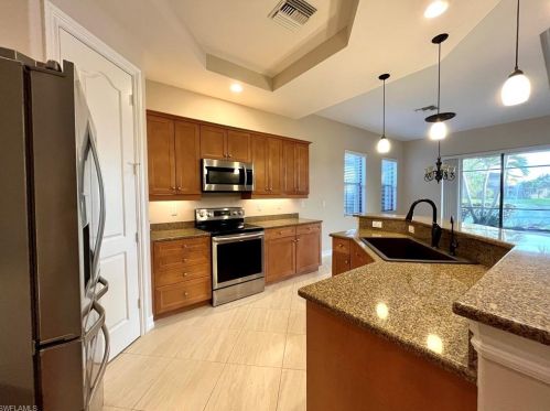 1419 Serrano Cir, Naples FL 34105-4951 exterior