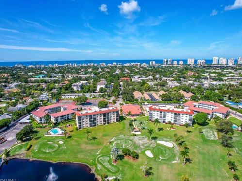 57 High Point Cir, Naples FL 34103-4242 exterior