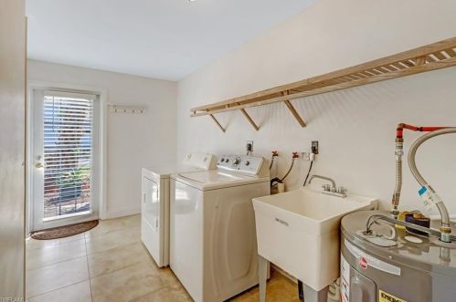 1301 Grand Canal Dr, Naples FL 34110-1506 exterior