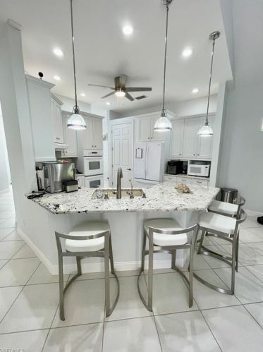 516 Eagle Crk Dr, Naples FL 34113-8015 exterior