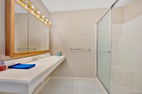 418 Devonshire Dr, Lake Nepessing MI 48446-4796 exterior