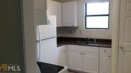 3165 Sarah Lou Dr, Lithonia, GA 30078-5751