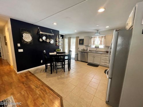 5541 Lamos Rd, Sylvan Beach MI 49461-9450 exterior