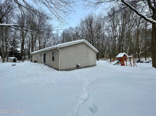 5541 Lamos Rd, Sylvan Beach MI 49461-9450 exterior