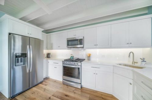 1283 Grand Canal Dr, Naples FL 34110-1506 exterior