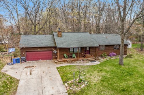 6724 Burton Woods Dr, Sylvan Beach, MI 49461-9600