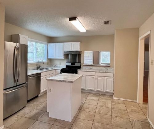 6223 Avery Island Ave, Austin TX  78727-6905 exterior