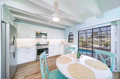 1283 Grand Canal Dr, Naples FL 34110-1506 exterior