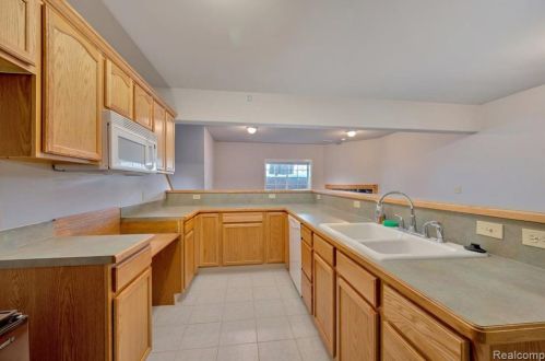 418 Devonshire Dr, Lake Nepessing MI 48446-4796 exterior