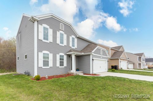 411 Pioneer Trl, Cedar Springs, MI 49319-8136