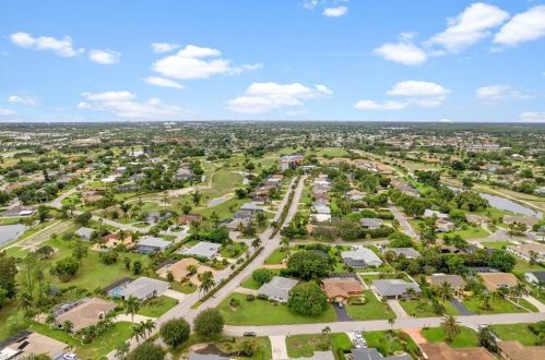 59 Pebble Bch Blvd, Naples FL 34113-8349 exterior