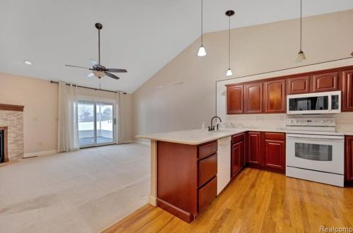 418 Devonshire Dr, Lake Nepessing MI 48446-4796 exterior