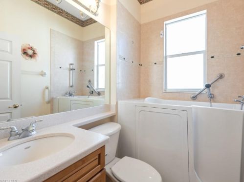 3535 Grand Cypress Dr, Naples FL 34119-7923 exterior