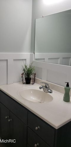 203 Elizabeth St, Sylvan Beach MI 49461-1116 exterior