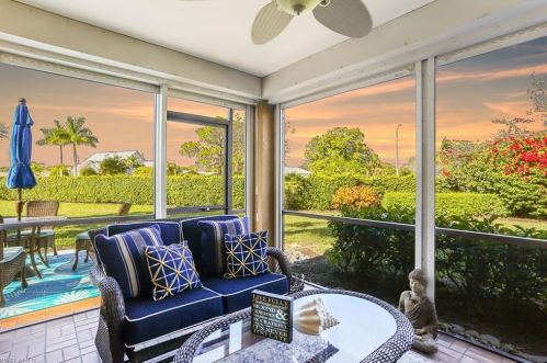 566 Beachwalk Cir, Naples FL 34108-7734 exterior