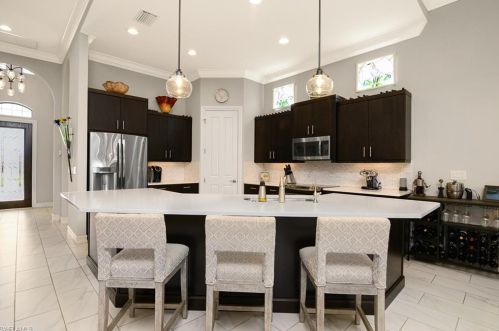 7403 Lantana Cir, Naples FL 34119-9704 exterior