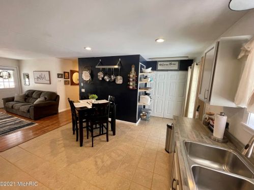 5541 Lamos Rd, Sylvan Beach MI 49461-9450 exterior