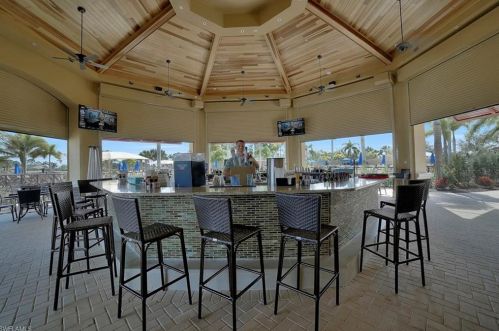 8961 Quarry Dr, Naples FL 34120-5256 exterior