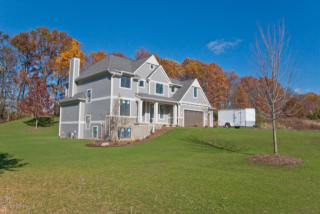 8141 Ashwood Dr, Ada, MI 49301-8167