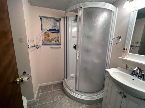 135 Grn Crk Rd, Meskegon MI 49445-2250 exterior