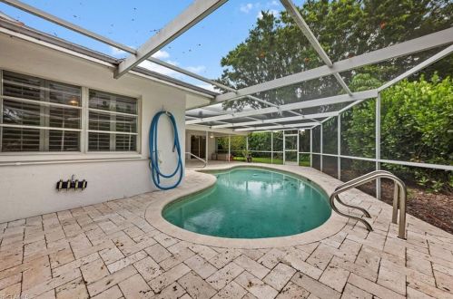 59 Pebble Bch Blvd, Naples FL 34113-8349 exterior