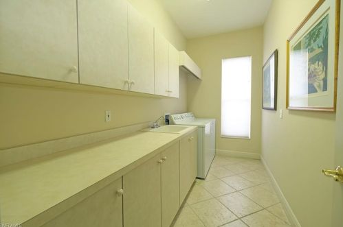 2738 Olde Cypress Dr, Naples FL 34119-9730 exterior