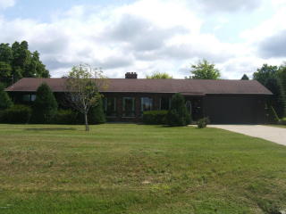 505 Peach St, Sylvan Beach, MI 49461-1429