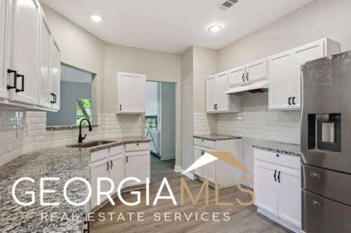 1386 Highgrove Way, Atlanta GA  30349-7510 exterior